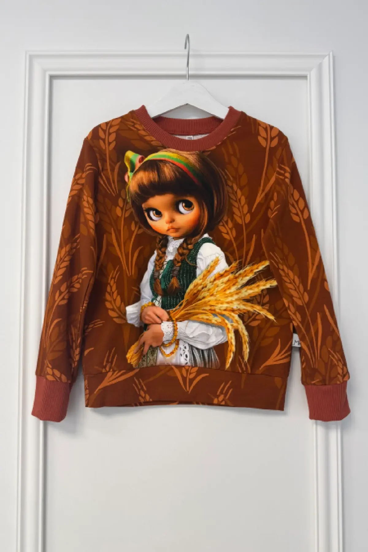 Džemperis su Lietuvos simbolika.